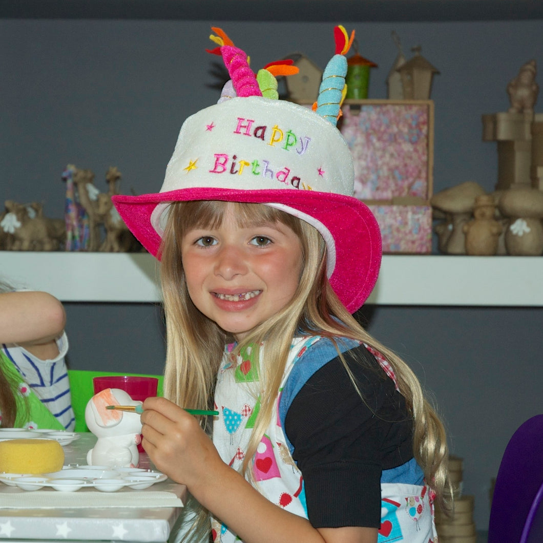 Birthday girl celebrating her day with a party at Create It.