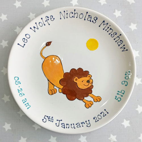 Baby keepsake plate with cute lion, baby's name, date of birth, time of birth and weight.