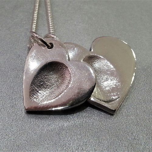 Love Prints large heart charms with fingerprints on sterling silver snake chain.