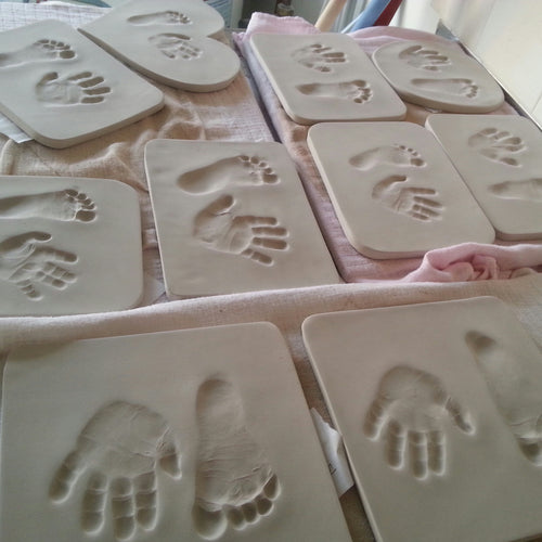 A selection of Clay Imprints waiting to go in the kiln.  
