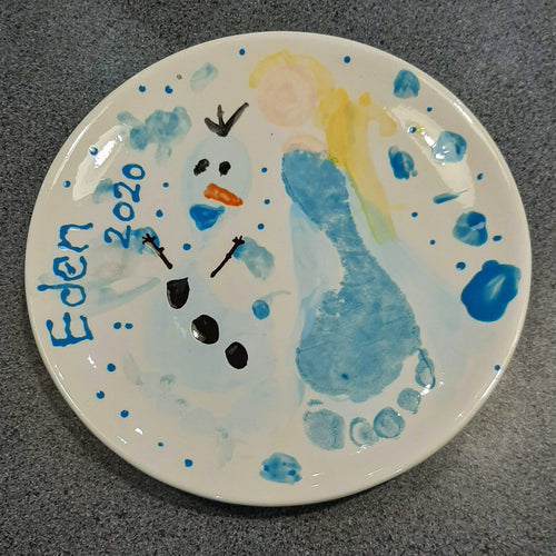 Blue footprints on a Small Coupe Plate turned into Elsa and Olaf from Frozen.