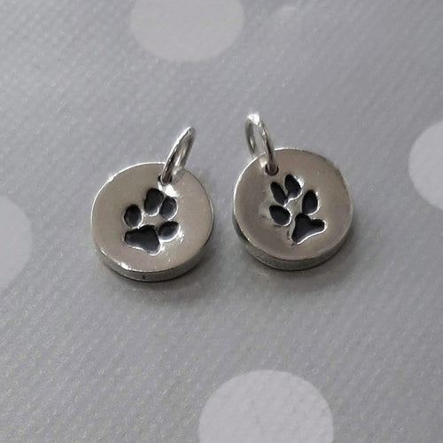 Love Prints small round charms with pawprints on each. 