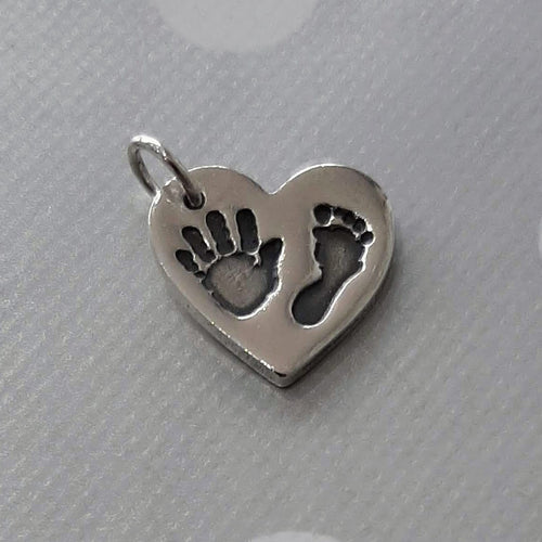 Love Prints large heart charm with hand and foot print.