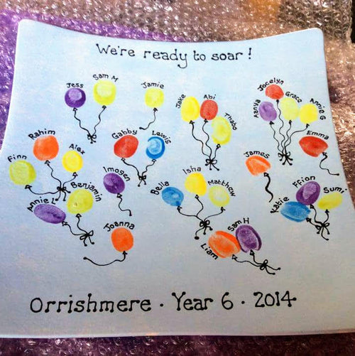 A class gift on leaving primary school with children's fingerprints turned into balloons.