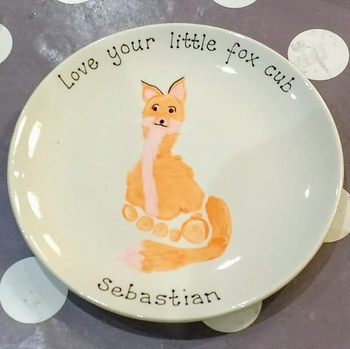 Small Coupe Plate with an orange footprint turned into a fox with personalised message.