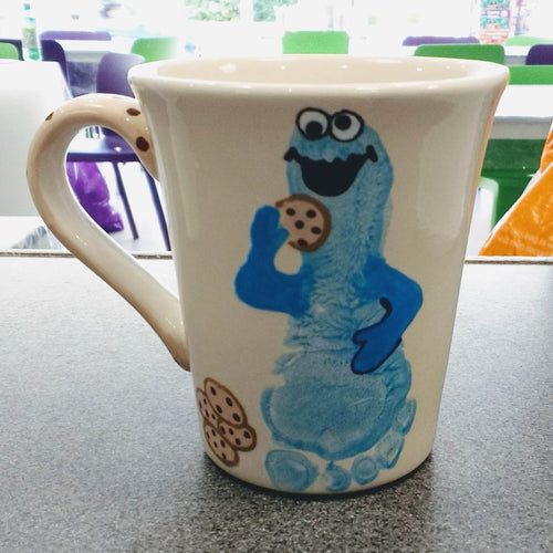 Cone Flare Mug with blue footprint turned into the Cookie Monster.