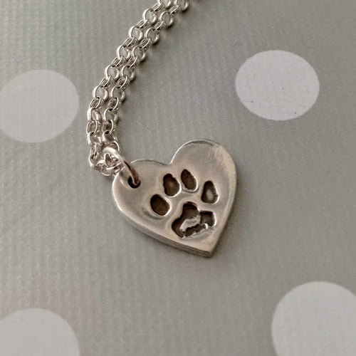 Love Prints heart charm with paw print on sterling silver belcher chain.