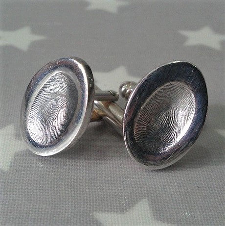 Love Prints oval fingerprint charms on sterling silver cufflinks.