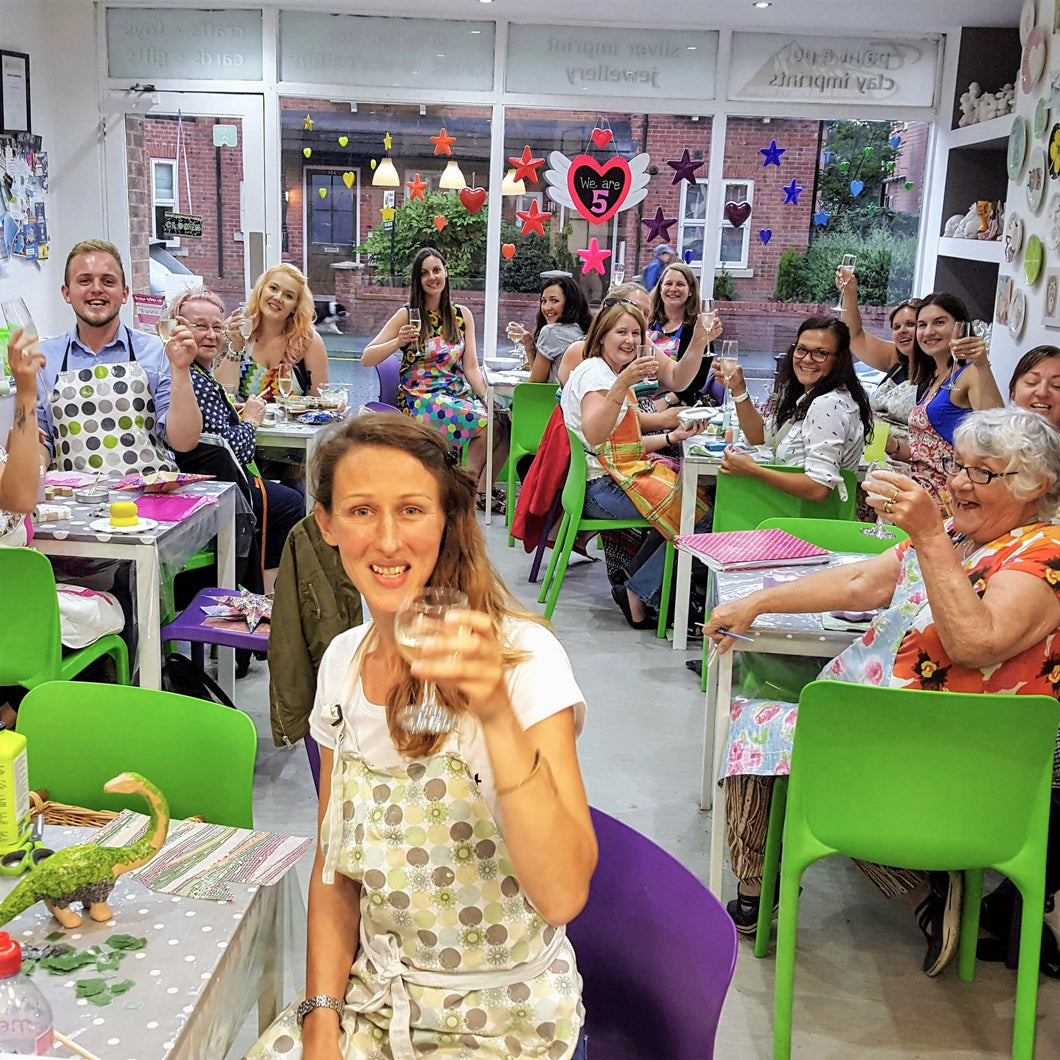 Raising a toast at one of our evening sessions. Pottery painting  and Prosecco.