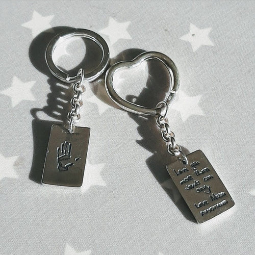 Love Prints rectangle charms with hand print and writing on sterling silver key chains and keyrings.